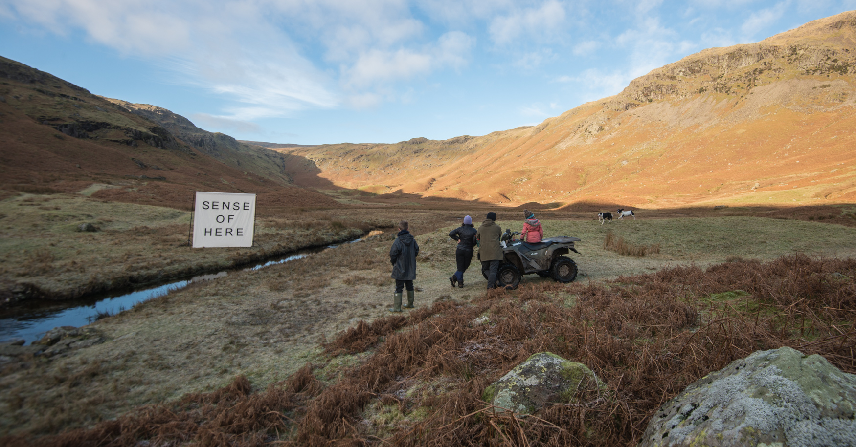 Talking about the land with the farmer and his children.