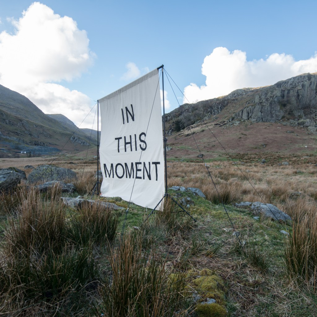Side view of the canvas showing the support poles and guy ropes