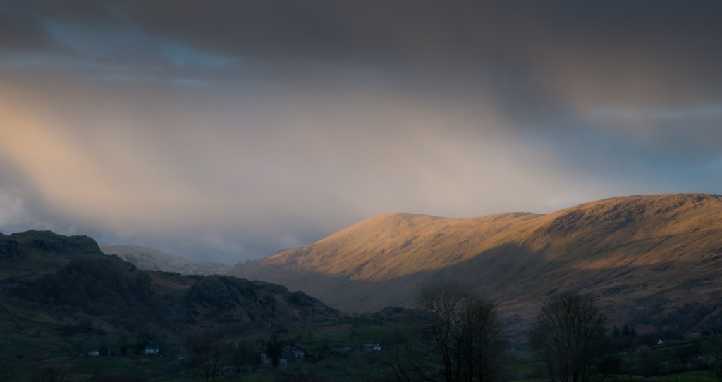 Late afternoon sun on Kentmere Pike, before a band of hail swept across the valley