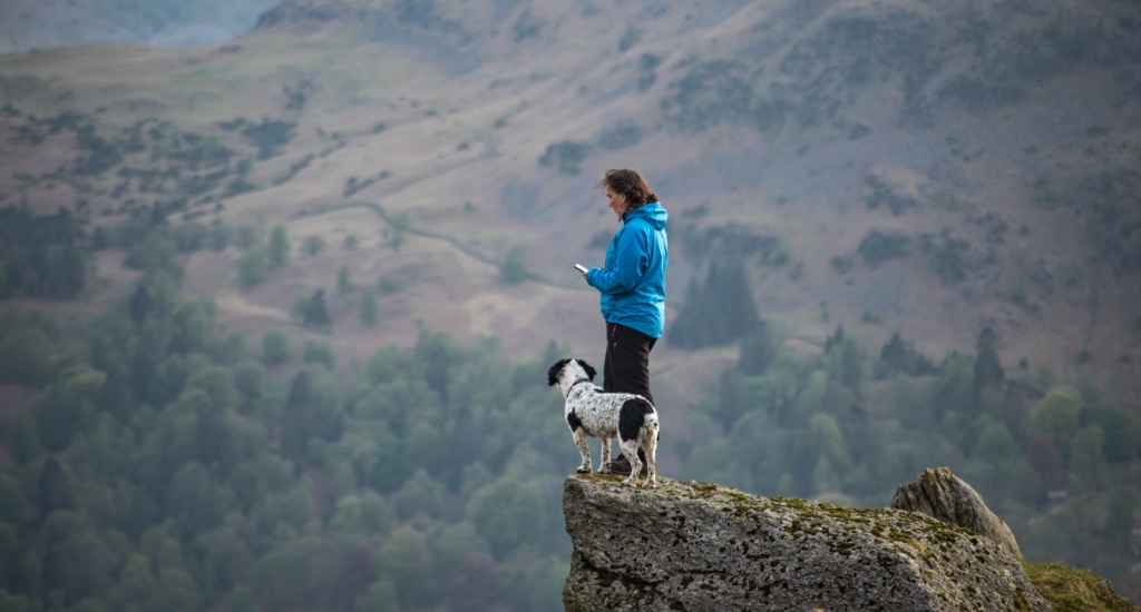 Taking in the feel of the place from a small rocky outcrop above Grasmere.